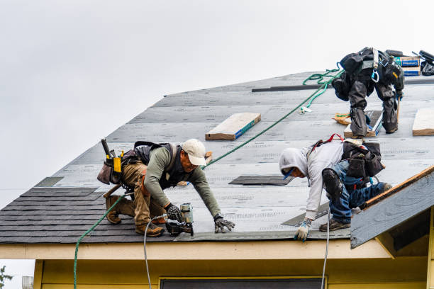 Professional Gutter Installation technician working in Goodland, FL